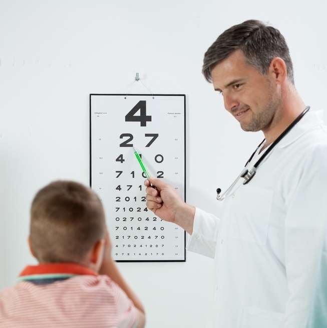 Pediatrist make to his patient eye test-418154-edited.jpeg