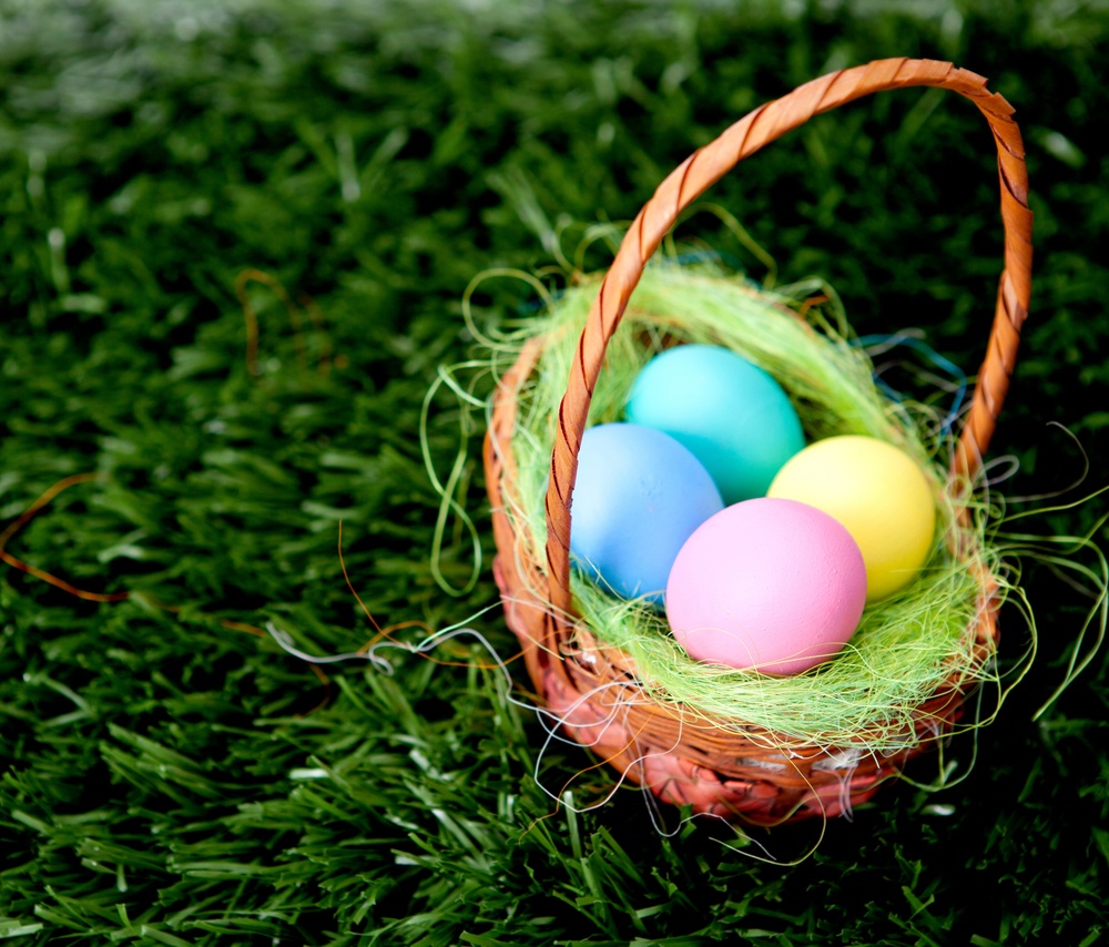 Plain colorful Easter Eggs in a bastket.jpeg